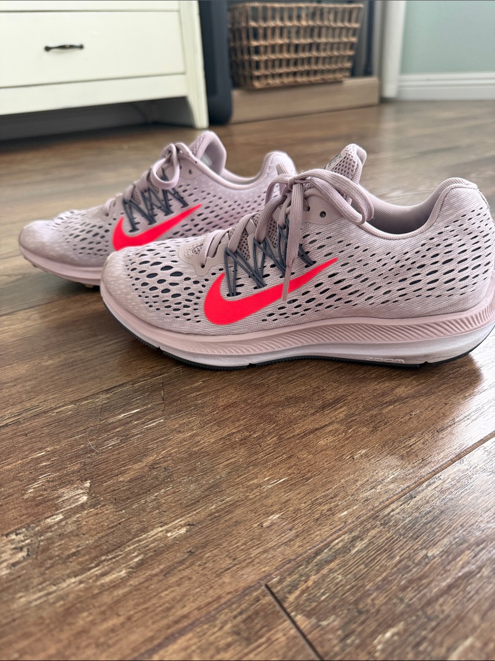 Nike Women’s Pale Pink Running Shoes with Neon Coral Swoosh